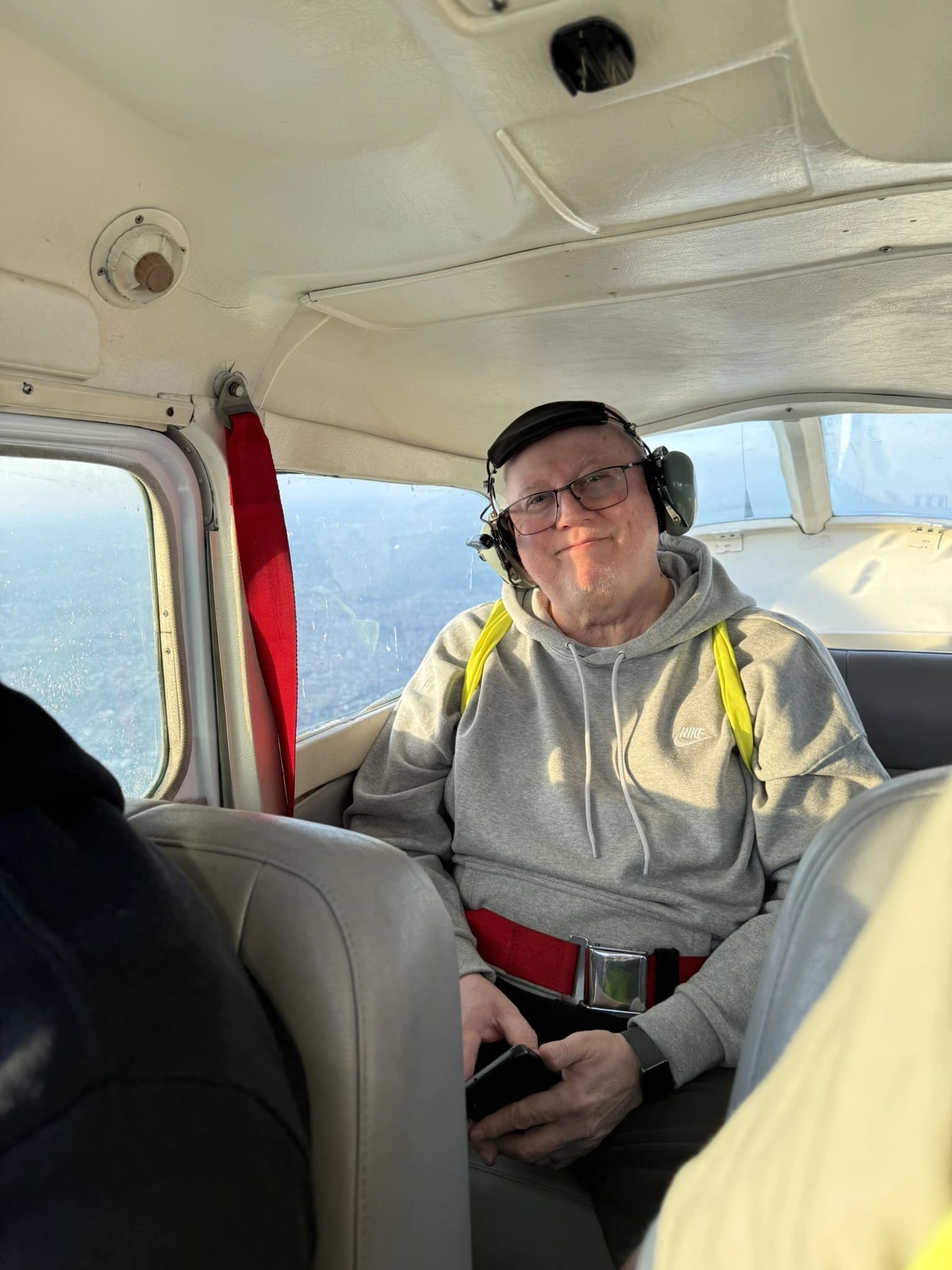 Pasajero en cabina durante el vuelo bautismo
